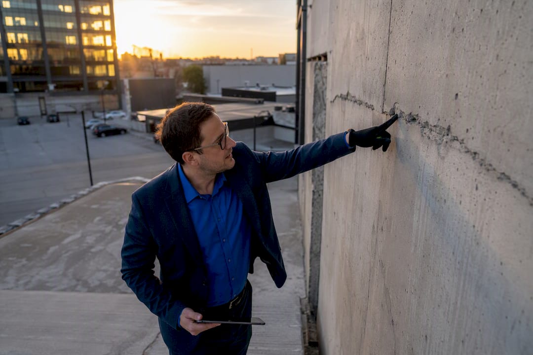 Investor inspecting commercial property defect