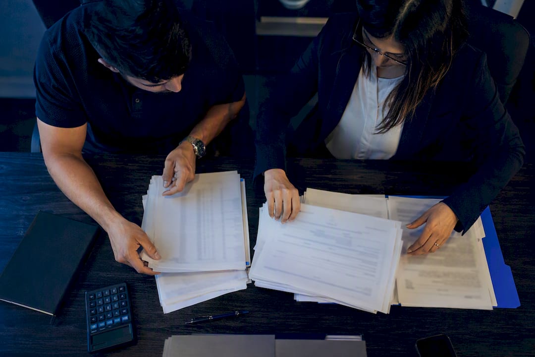 Investor organizing rental property loan records