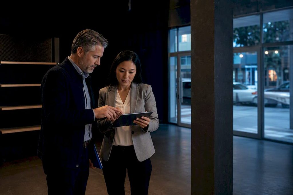 Investor and lender reviewing property financing