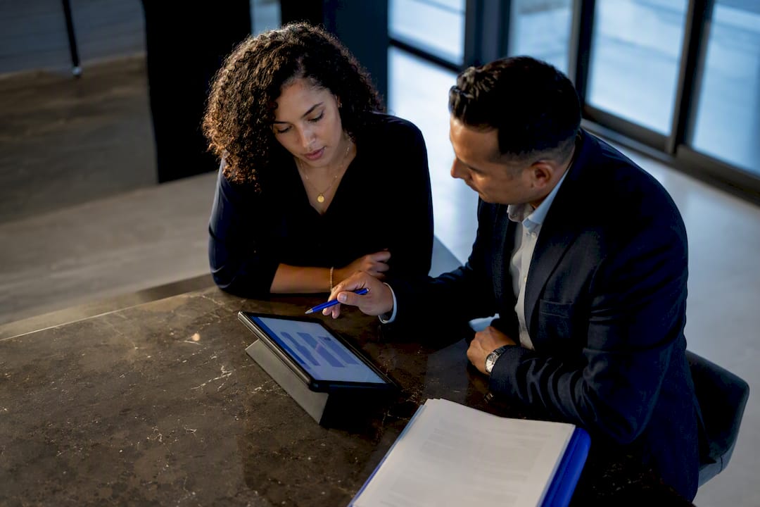 Homebuyer and closing professional verifying funds