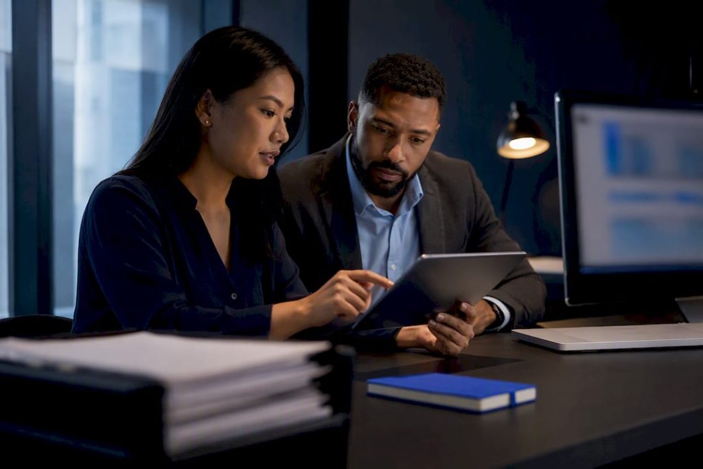 Asset managers reviewing lease abstraction workflow